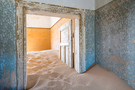 The interior of a building in the abandoned diamond mining ghost town of Kolmanskop, Namibia, Africa Stock Photo - Premium Royalty-Free, Code: 6119-09182617