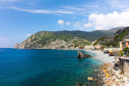 rocky coast - View of the beach at Monterosso on a sunny day with blue skies, Cinque Terre, UNESCO World Heritage Site, Liguria, Italy, Europe Stock Photo - Premium Royalty-Free, Code: 6119-09182803
