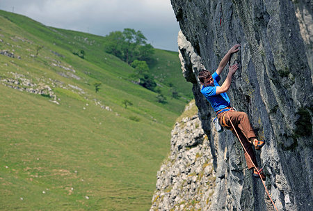 Rock climber in action, Yorkshire Dales National Park, North Yorkshire, England, United Kingdom, Europe Stock Photo - Premium Royalty-Free, Code: 6119-09182943