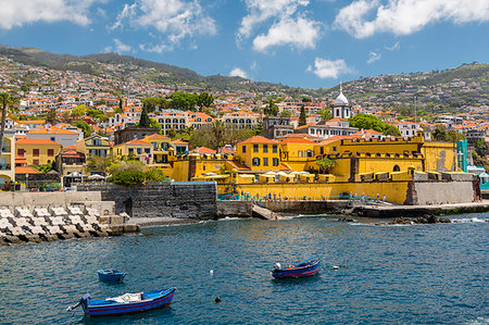 funchal - View of fishing boats in harbour and St. James Fort, Funchal, Madeira, Portugal, Atlantic, Europe Stock Photo - Premium Royalty-Free, Code: 6119-09182961