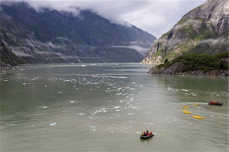 Kayak expedition preparations, Tracy Arm Fjord, clearing mist, icebergs and cascades, near South Sawyer Glacier, Alaska, United States of America, North America Photographie de stock - Premium Libres de Droits, Code: 6119-09101712