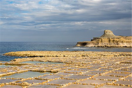 simsearch:400-08695427,k - Traditional salt pans cut into the rock on the coast of Gozo, Malta, Mediterranean, Europe Foto de stock - Sin royalties Premium, Código: 6119-09127123