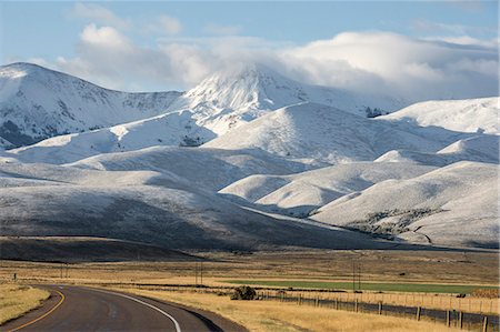 road in mountain in winter - Bitterfoot Range, with the first snow of winter, South West Montana, United States of America, North America Stock Photo - Premium Royalty-Free, Code: 6119-09134898