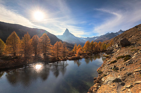 Grindjisee Lake by Matterhorn during autumn in Zermatt, Switzerland, Europe Foto de stock - Sin royalties Premium, Código: 6119-09253329