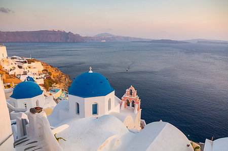 View of blue domes of churches in Oia village, Santorini, Cyclades, Aegean Islands, Greek Islands, Greece, Europe Stock Photo - Premium Royalty-Free, Code: 6119-09253450