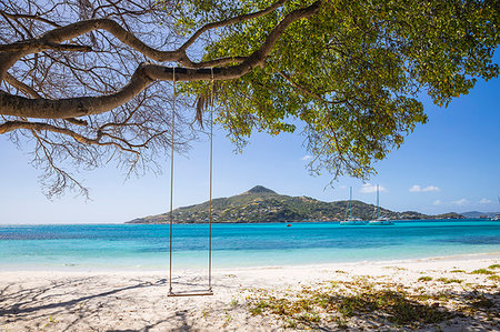 Looking across to Carriacou, Grenada, Petit St. Vincent, The Grenadines, St. Vincent and The Grenadines, West Indies, Caribbean, Central America Stock Photo - Premium Royalty-Free, Code: 6119-09202749