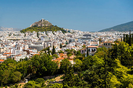 View of Athens and Likavitos Hill over the rooftops of the Plaka District from The Acropolis, Athens, Attica Region, Greece, Europe Photographie de stock - Premium Libres de Droits, Code: 6119-09202896