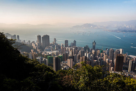 simsearch:841-09085793,k - View over Victoria Harbour at sunset, seen from Victoria Peak, Hong Kong Island, Hong Kong, China, Asia Foto de stock - Sin royalties Premium, Código: 6119-09214156