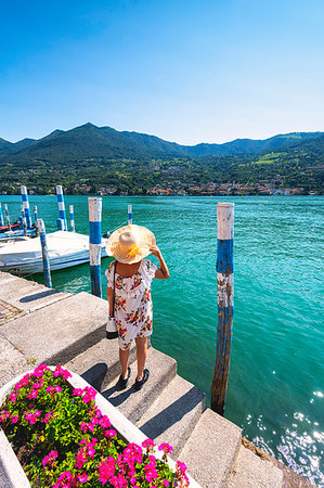 simsearch:841-09230051,k - Woman admiring the Iseo Lake seen from Monte Isola, the largest lake island in Europe, Province of Brescia, Lombardy, Italy, Europe Stock Photo - Premium Royalty-Free, Code: 6119-09214244