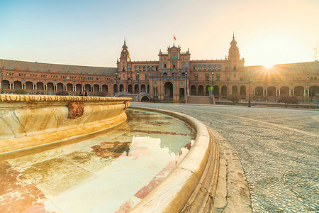 seville (city) - Vicente Traver fountain facing the tower and central building, Plaza de Espana, Seville, Andalusia, Spain, Europe Stock Photo - Premium Royalty-Free, Code: 6119-09228567