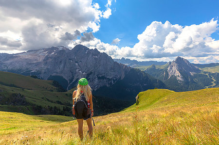 simsearch:841-03869823,k - Girl looks towards Marmolada from Viel del Pan path, Pordoi Pass, Fassa Valley, Trentino, Dolomites, Italy, Europe Stock Photo - Premium Royalty-Free, Code: 6119-09228793