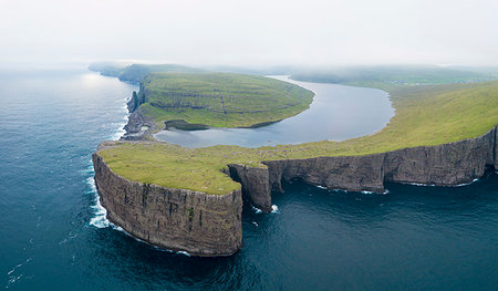 photography rocky islands mist - Lake Leitisvatn (Sorvagsvatn) on cliffs above the ocean, Vagar island, Faroe Islands, Denmark, Europe Stock Photo - Premium Royalty-Free, Code: 6119-09238615