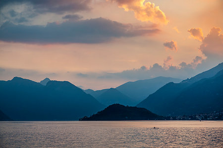 simsearch:862-07495937,k - View of solitary rowing boat on Lake Como at sunset, Province of Como, Lake Como, Lombardy, Italian Lakes, Italy, Europe Stock Photo - Premium Royalty-Free, Code: 6119-09239078