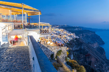 simsearch:6119-09238513,k - View of Greek restaurant overlooking the sea at Fira at dusk, Firostefani, Santorini (Thira), Cyclades Islands, Greek Islands, Greece, Europe Stock Photo - Premium Royalty-Free, Code: 6119-09239091