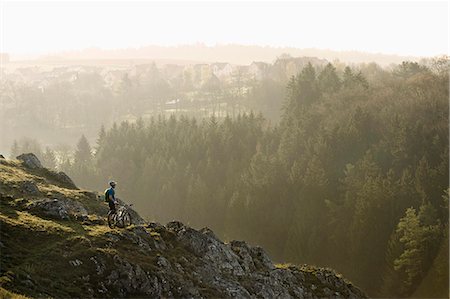 fußabdruck - Young man mountainbiking at sunrise, Bavaria, Germany Stockbilder - Premium RF Lizenzfrei, Bildnummer: 6121-07741743