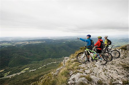 pals - three mountain bikers looking at view, Vipava valley, Istria, Nanos, Slovenia Stock Photo - Premium Royalty-Free, Code: 6121-07741778