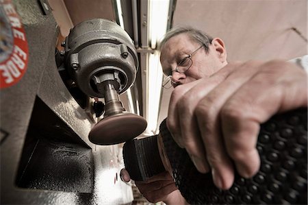 Cobbler working in workshop, close-up Stock Photo - Premium Royalty-Free, Code: 6121-07741898