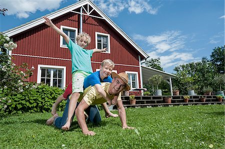 Father Wrestling With Kids Stock Photos Page 1 Masterfile