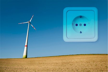 Wind turbine in field, Bavaria, Germany Stock Photo - Premium Royalty-Free, Code: 6121-07992666