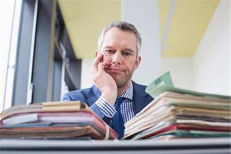 Businessman working in office, Leipzig, Saxony, Germany Foto de stock - Sin royalties Premium, Código: 6121-08106625