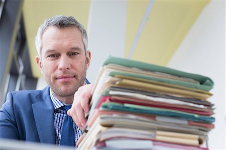 Businessman working in office, Leipzig, Saxony, Germany Foto de stock - Sin royalties Premium, Código: 6121-08106626