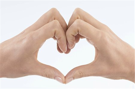 form (umriss) - Close-up of woman's hands making heart shape, Bavaria, Germany Stockbilder - Premium RF Lizenzfrei, Bildnummer: 6121-08228730