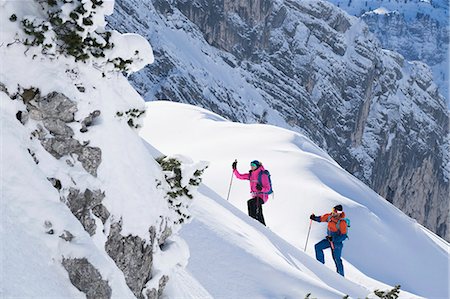 escalade de montagne - Couple climbing up the ski slope, Bavaria, Germany, Europe Photographie de stock - Premium Libres de Droits, Code: 6121-09146411