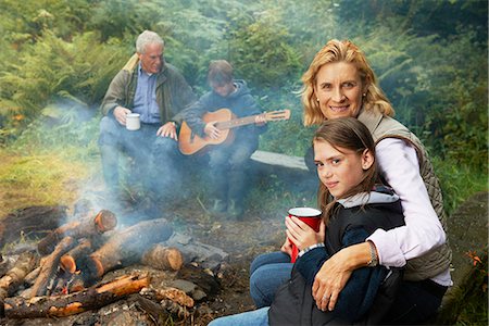 smoking smile - Grandparents and children by camp fire Stock Photo - Premium Royalty-Free, Code: 6122-07691705