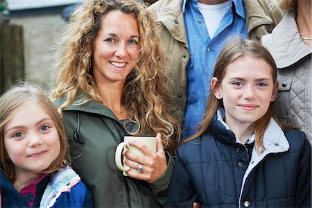 portrait family of five pose - Family drinking tea on the farm Stock Photo - Premium Royalty-Free, Code: 6122-07691710