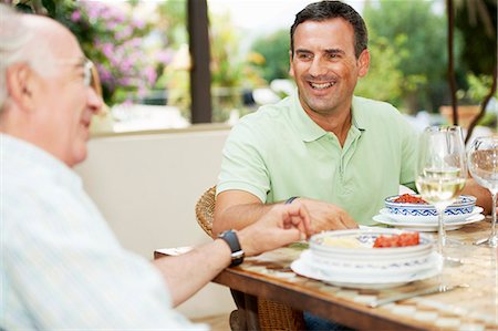 dining in spain - Father and son having lunch Stock Photo - Premium Royalty-Free, Code: 6122-07692109