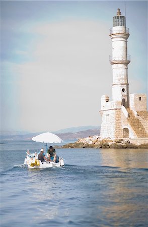 simsearch:649-08004137,k - Fisher boat and light house Stock Photo - Premium Royalty-Free, Code: 6122-07692336