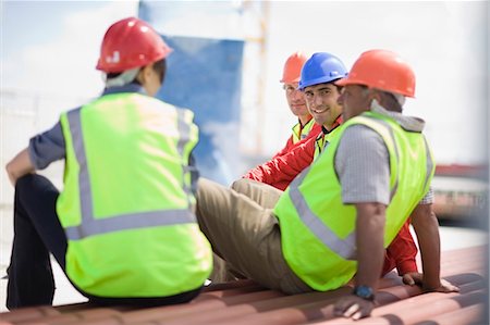 Building workers having a rest Stock Photo - Premium Royalty-Free, Code: 6122-07693125