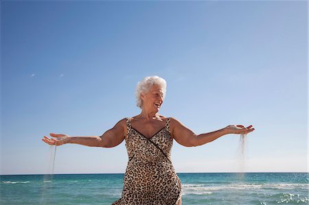 seniors sea - Senior Woman on the beach Stock Photo - Premium Royalty-Free, Code: 6122-07693479