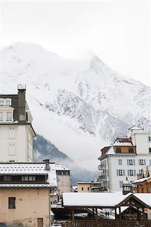 snow mountain town - Mountain and buildings in chamonix Stock Photo - Premium Royalty-Free, Code: 6122-07694170