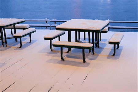 Snow covered tables and benches Stock Photo - Premium Royalty-Free, Code: 6122-07694199