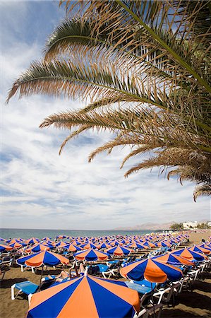parasol - Parasols on Puerto del Carmen beach , Lanzarote Stock Photo - Premium Royalty-Free, Code: 6122-07695082