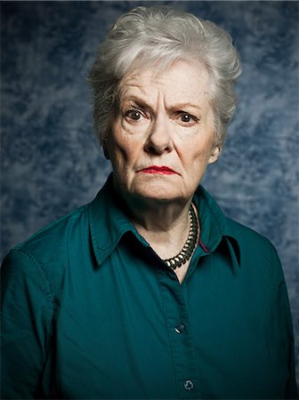 senior pattern - Stuido portrait of angry senior woman Stock Photo - Premium Royalty-Free, Code: 6122-07695000