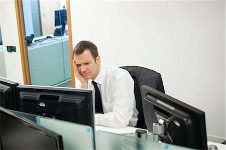 simsearch:693-03301185,k - Worried businessman in office Stock Photo - Premium Royalty-Free, Code: 6122-07696314