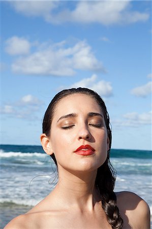puerto rico beach - Woman on beach with eyes closed Stock Photo - Premium Royalty-Free, Code: 6122-07696882