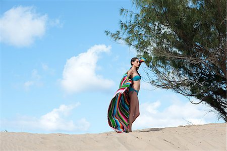 puerto rico beach - Woman standing on sand dune Stock Photo - Premium Royalty-Free, Code: 6122-07696899