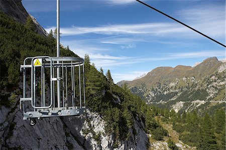 Empty chair lift, Marmolada mountains, Dolomites, Italy Photographie de stock - Premium Libres de Droits, Code: 6122-07696913