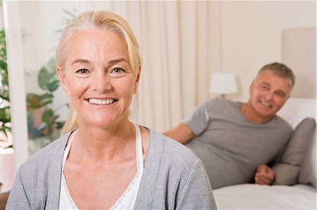 retirement and relaxation at home - Mature couple in bedroom Stock Photo - Premium Royalty-Free, Code: 6122-07697027