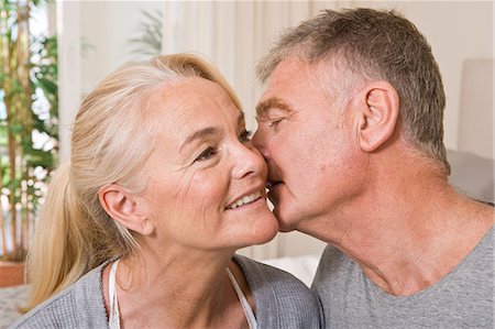 seniors and whispering - Intimate mature couple Stock Photo - Premium Royalty-Free, Code: 6122-07697024