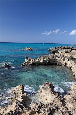 Rocks and Caribbean Sea, Grand Cayman, Cayman Islands Photographie de stock - Premium Libres de Droits, Code: 6122-07697985