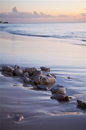 Caribbean sea washing over beach and rocks, Grand Cayman, Cayman Islands Foto de stock - Sin royalties Premium, Código: 6122-07697989