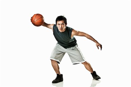 full body man white background not illustration and one person not happy - Basketball player holding ball Stock Photo - Premium Royalty-Free, Code: 6122-07698073