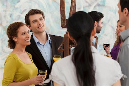 female gallery - Men and women looking at sculpture in art gallery Stock Photo - Premium Royalty-Free, Code: 6122-07698350