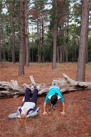 simsearch:649-05950199,k - Women exercising together in forest Stock Photo - Premium Royalty-Free, Code: 6122-07700503