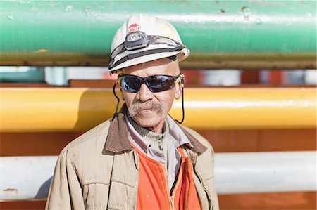 Close up of oil rig worker Stock Photo - Premium Royalty-Free, Code: 6122-07700873