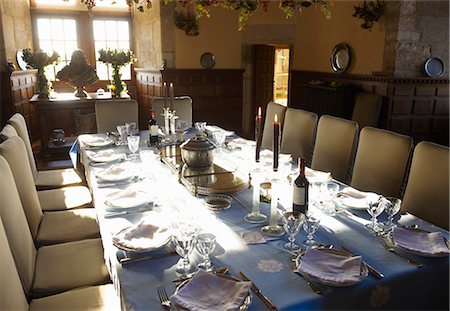 Ornate table settings in dining room Photographie de stock - Premium Libres de Droits, Code: 6122-07702598